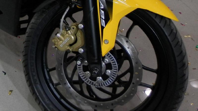 Contoh rem depan motor yang dilengkapi ABS. Contoh rem depan motor yang dilengkapi ABS.