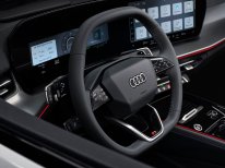 Audi Q3 Sportback e-hybrid Glacier white metallic, static studio shot, interior, detail view cockpit