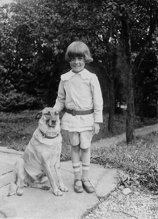 A boy and his dog, 1940s