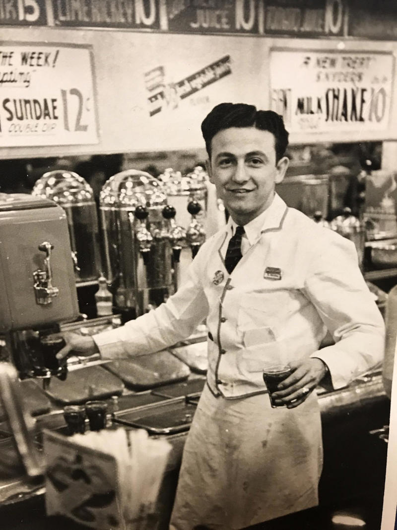 A man working at a soda shop, 1940s