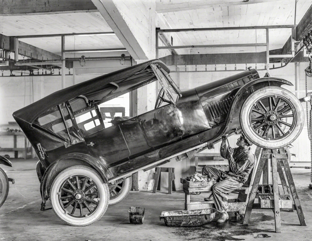 1. An Early 1900s Auto Mechanic Crushing It