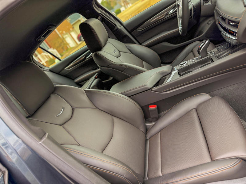 The massaging black leather front seats were comfortable with aggressive side bolstering to hold you firmly in place while cornering.