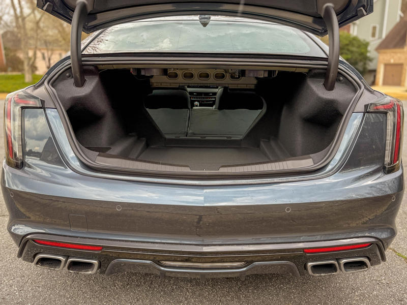 Behind the driver is a moderately sized 11.9 cubic foot trunk that's on par with the Mercedes C-Class, but trails the BMW's 16.9 cubic foot compartment.