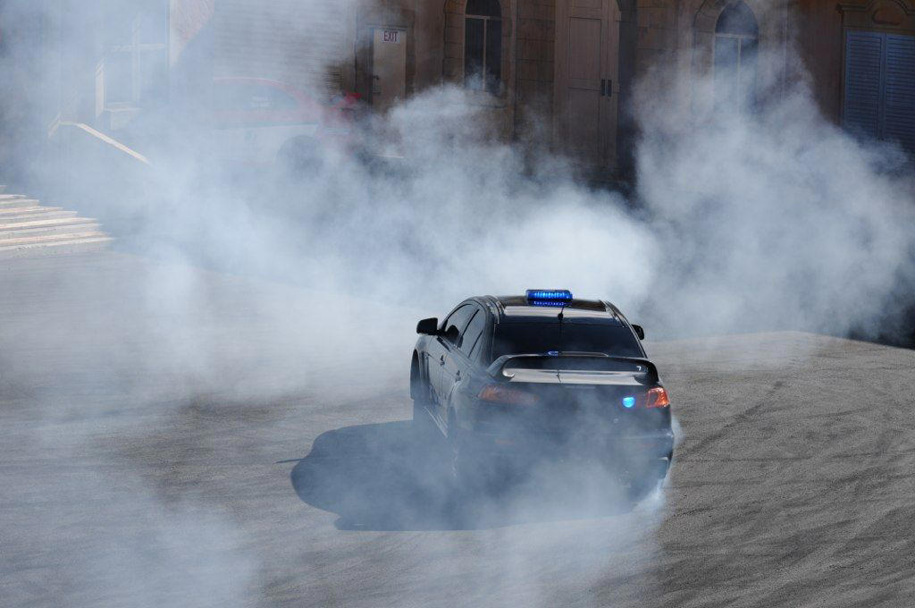 File:Polizia car drifting at Hollywood Stunt Driver.jpg