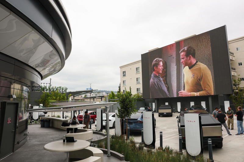 Besides the food and charging access, it's also part drive-in movie theater.