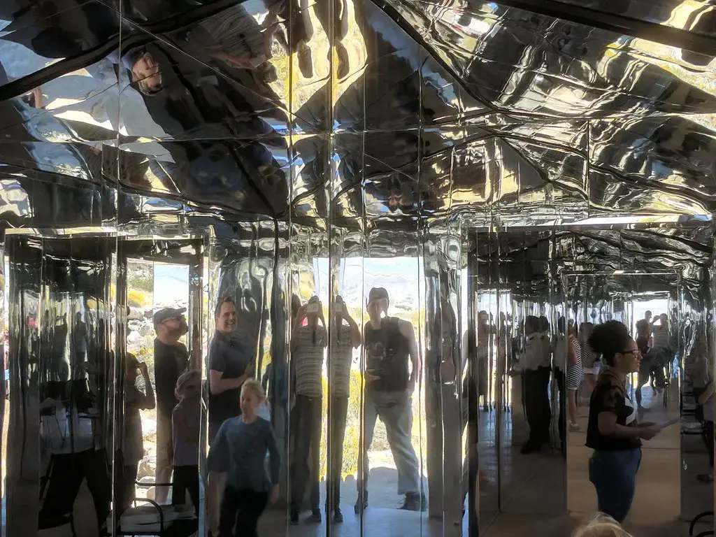 8. The House of Mirrors with Glass Panels