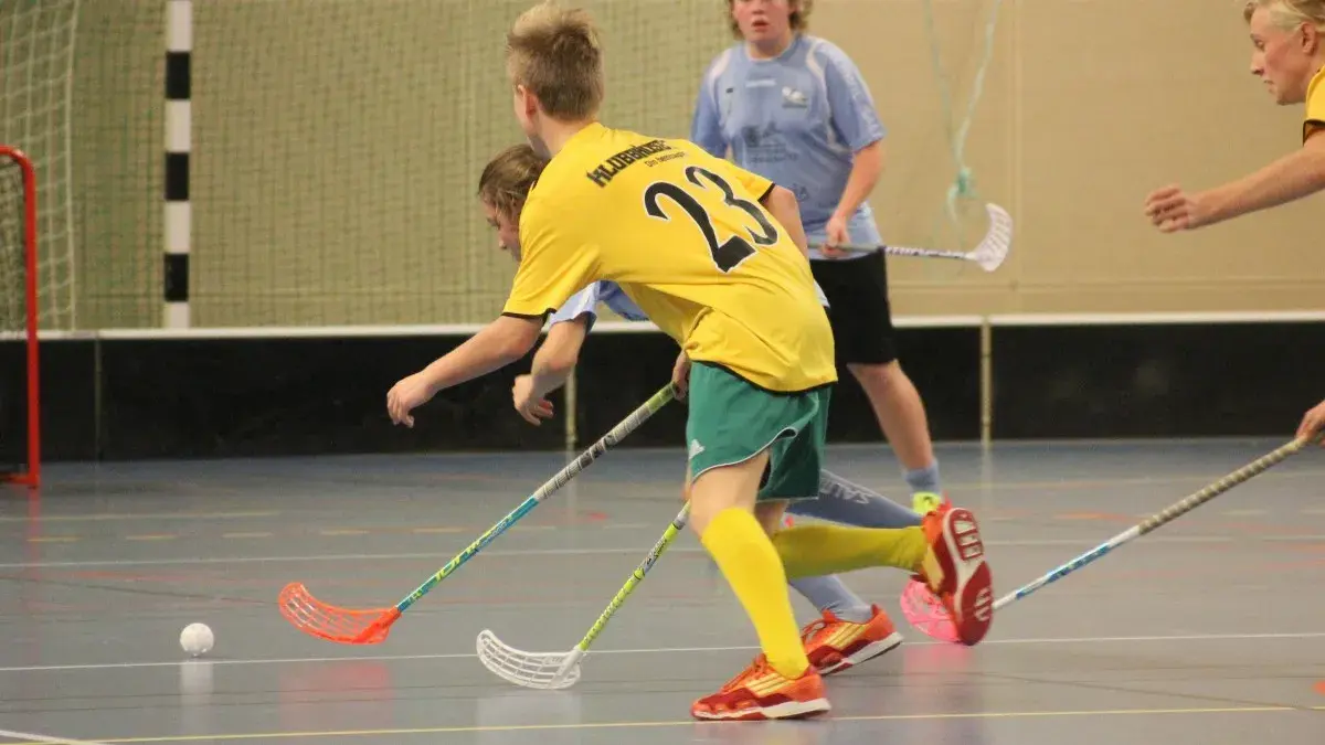 7. Floor Hockey with Real Sticks