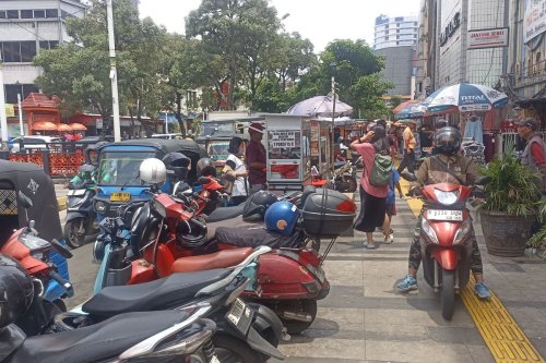 Parkir Liar Jakarta: Kesemrawutan & Pungutan Ilegal Tak Berujung