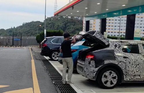 Perodua ‘QV-E’ EV parked next to BYD Atto 3 while testing shows good size, proportions; daring roofline