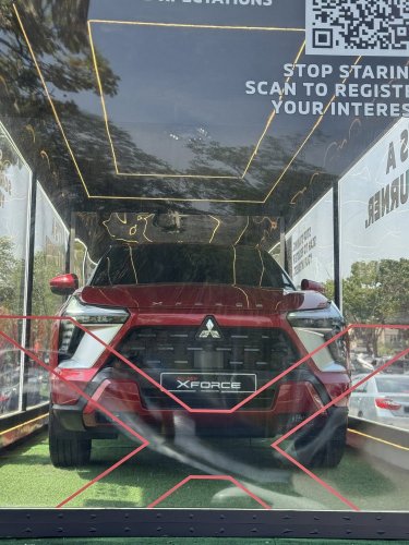 Mitsubishi Xforce spotted again in Malaysia on the back of a roving truck – nationwide tour until March 15